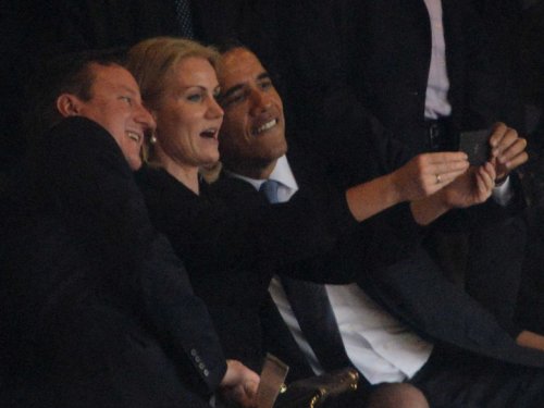 U.S. President Barack Obama, Danish Prime Minister Helle Thorning-Schmidt and U.K. Prime Minister David Cameron take a selfie at Nelson Mandela's funeral, Johannesburg, South Africa, 10 December 2013, by Steve Harvey